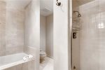 Primary bathroom with separate soaking tub